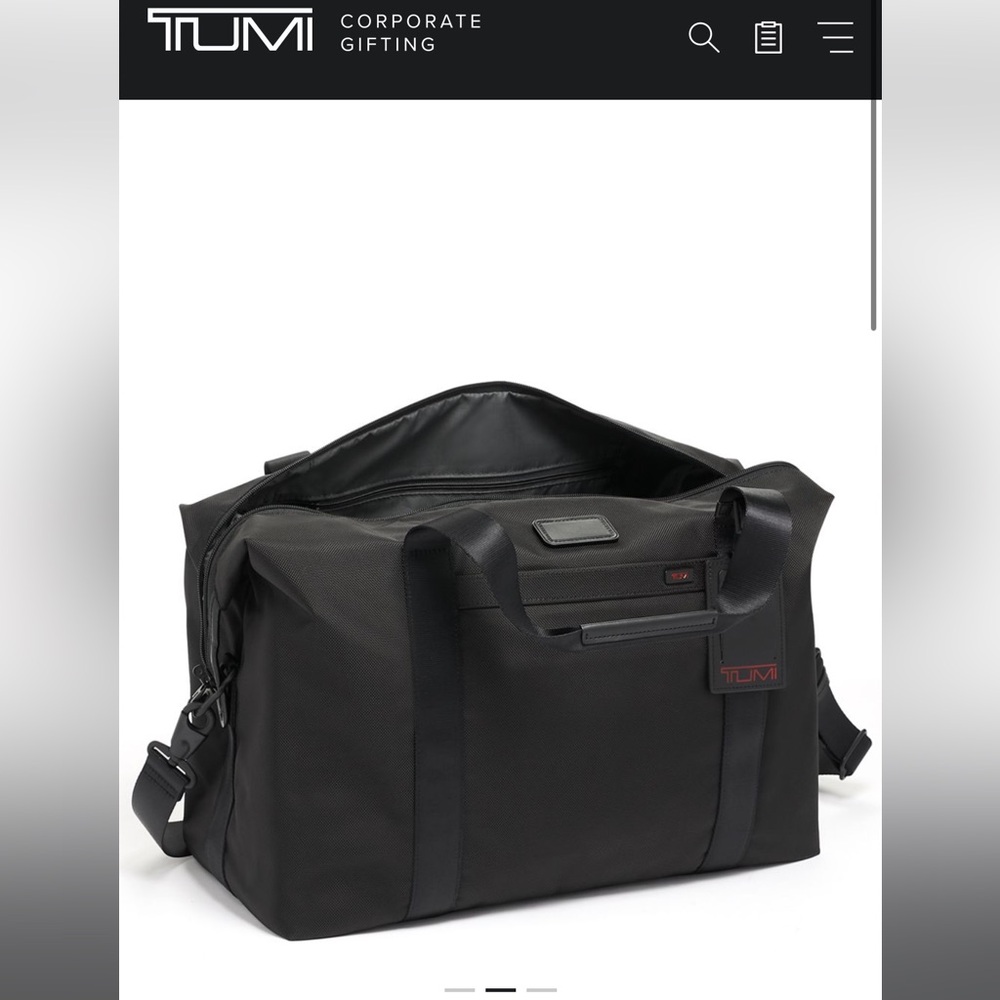 Tumi travel bag, brand new